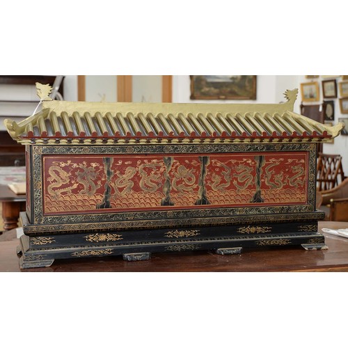 961 - A Chinese lacquered casket, early 20th c, with pagoda style cover, split interior and second compart... 