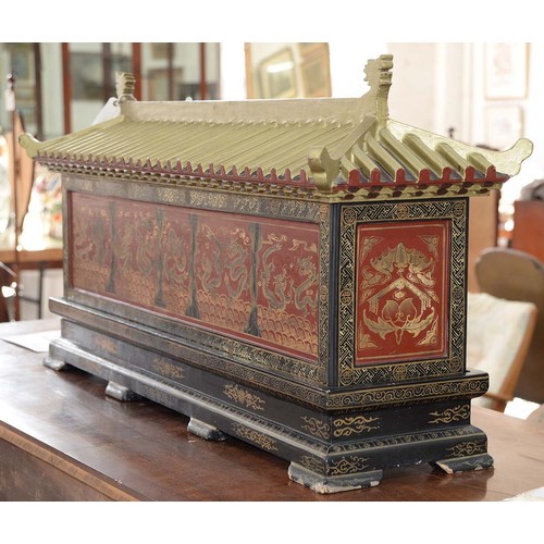 961 - A Chinese lacquered casket, early 20th c, with pagoda style cover, split interior and second compart... 