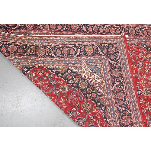 929 - A Persian carpet, 330 x 244cm