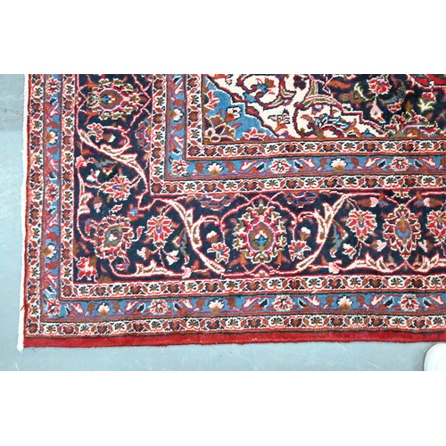 929 - A Persian carpet, 330 x 244cm