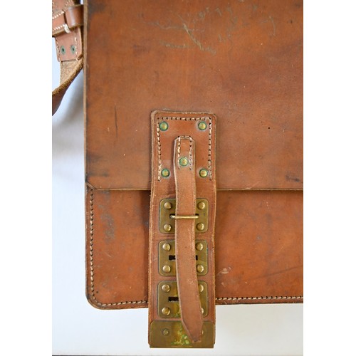 669 - A leather satchel, c1930, with brass fastenings, the inside stamped A B L, 40cm w