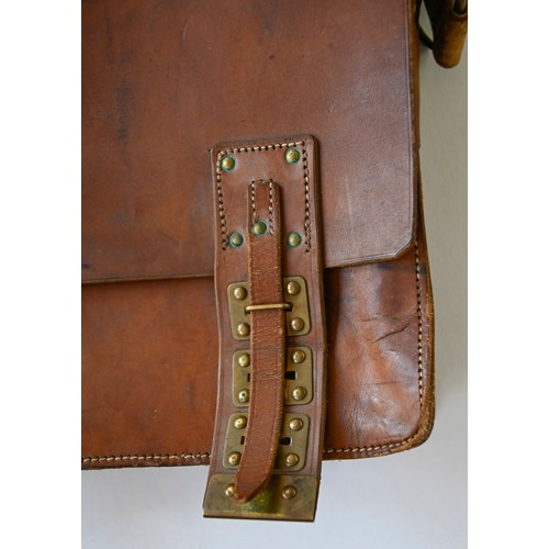 669 - A leather satchel, c1930, with brass fastenings, the inside stamped A B L, 40cm w