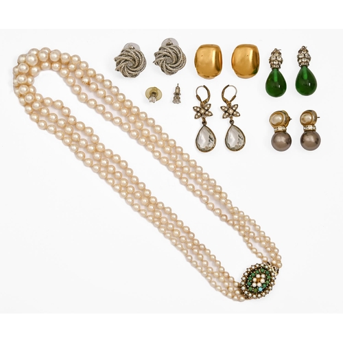 178 - A cultured pearl three row necklace, 20th c, of 4-8mm cultured pearls, oval gold clasp marked 9ct an... 