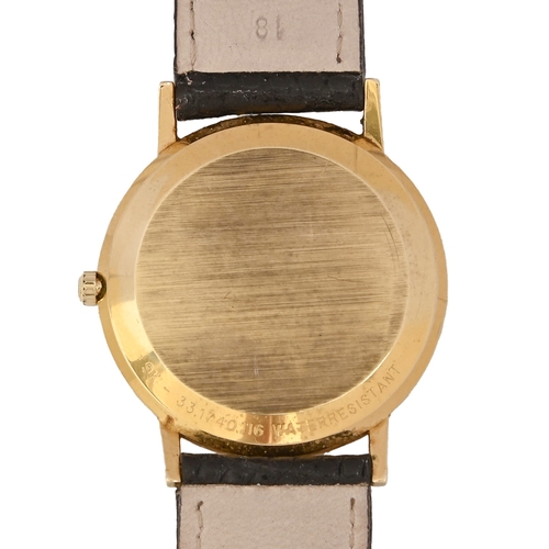 144 - A Zenith gold gentleman's wristwatch, quartz movement, 33mm diam, on leather strap with buckle, make... 