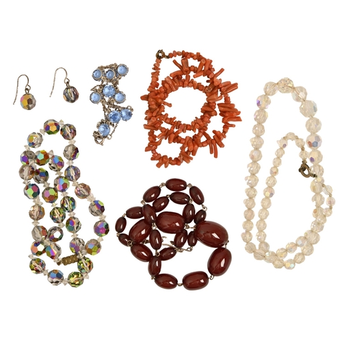 151 - A necklace of faturan beads, 22.8g, a coral necklace and two others (4)