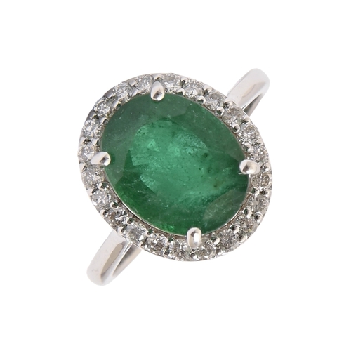 161 - An emerald and diamond ring, the emerald weighting 3.33ct, in 18ct white gold, 4.2g, size M... 