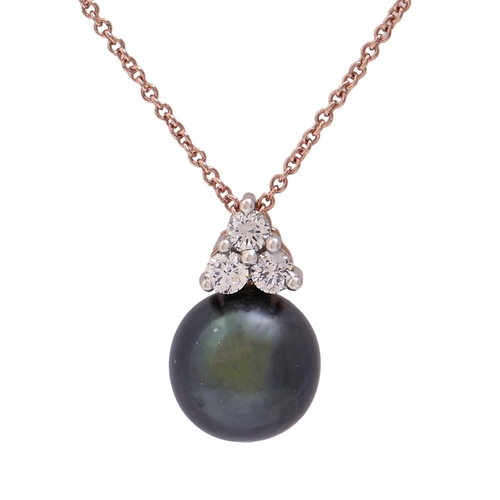 166 - A black cultured pearl and diamond pendant, in gold, 16mm h, marked 375, on gold chain marked 375, 3... 