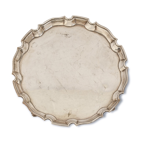 320 - An Elizabeth II silver salver, on four feet, 30.5cm diam, by Roberts & Belk Ltd, Sheffield 1970,... 