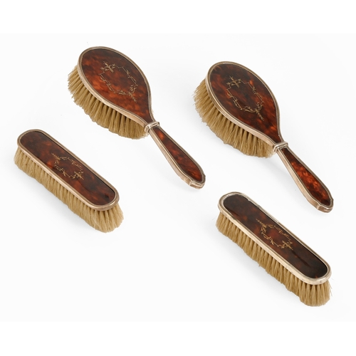 322 - A set of four George V gold inlaid tortoiseshell inset silver brushes, by Synyer & Beddoes, Birm... 