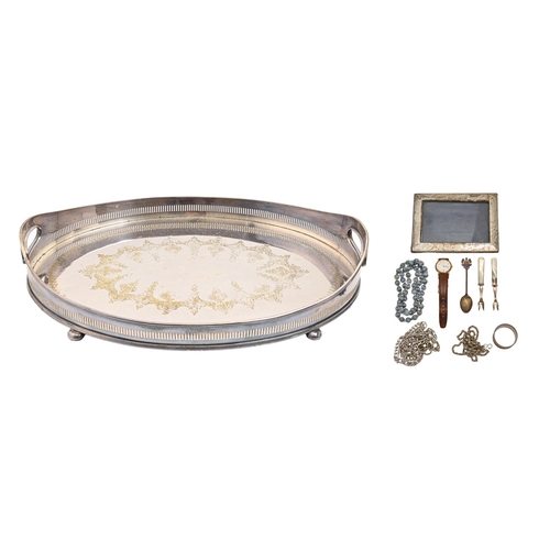 337 - An EPNS oval galleried tray, on bun feet, 61cm w, a silver photograph frame, Birmingham 1912, a silv... 