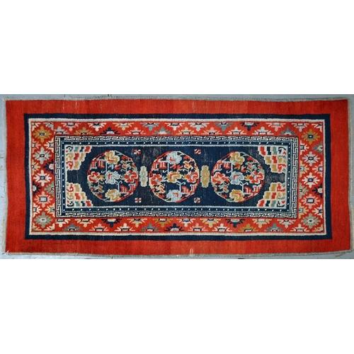 772 - Two antique Tibetan rugs, 170 x 81cm and 164 x 82cm