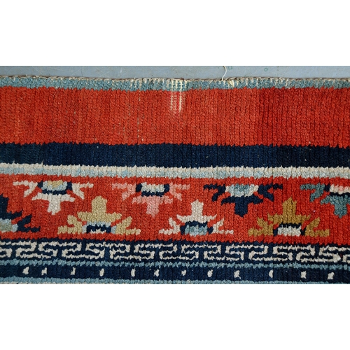 772 - Two antique Tibetan rugs, 170 x 81cm and 164 x 82cm