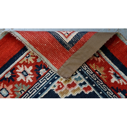 772 - Two antique Tibetan rugs, 170 x 81cm and 164 x 82cm