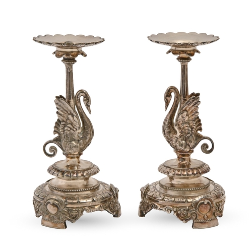 302 - Elkington & Co. A pair of Victorian EPNS swan candlesticks, 20cm h, maker's mark and date letter... 