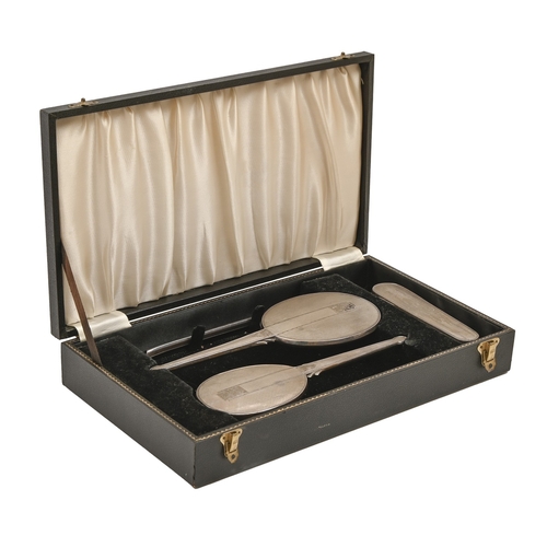 305 - An Elizabeth II silver brush set, engine turned, by W I Broadway & Co, Birmingham 1959, cased... 