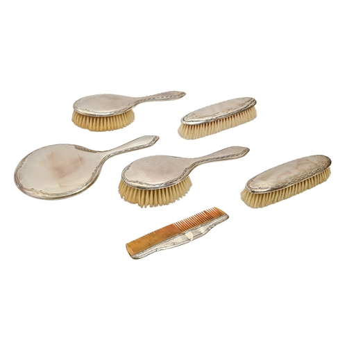 306 - A George V silver brush set, marks rubbed, Chester 1926, cased