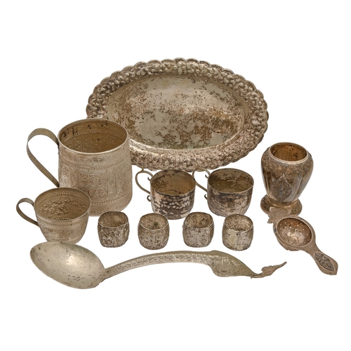 310 - Miscellaneous Thai silver epoussé articles, 20th c, to include cups and mugs, with embossed or repou... 