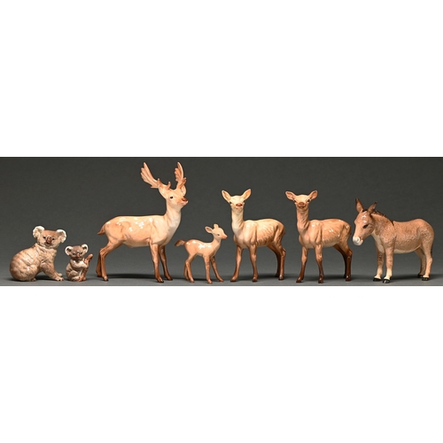 351 - Seven Beswick models of animals, including deer and donkey, largest 19cm h, printed mark... 