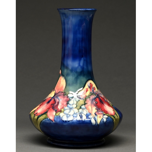 355 - A Moorcroft Orchid vase, c1960, 31.5cm h, impressed and painted marks and paper label POTTERS TO THE... 