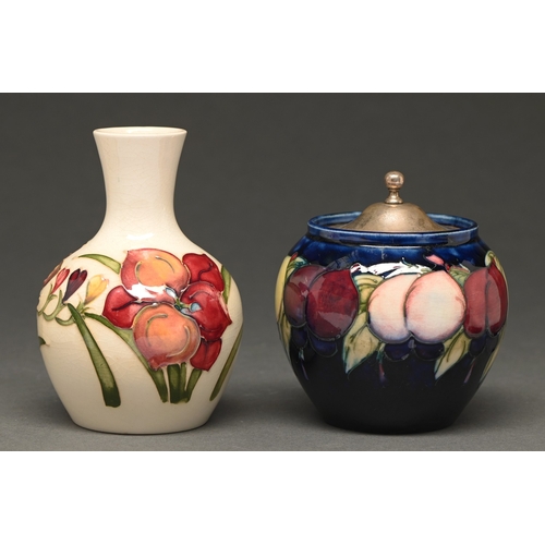 363 - A Moorcroft Wisteria preserve pot and plated cover and a Moorcroft Africa Lily on white vase, c1925 ... 