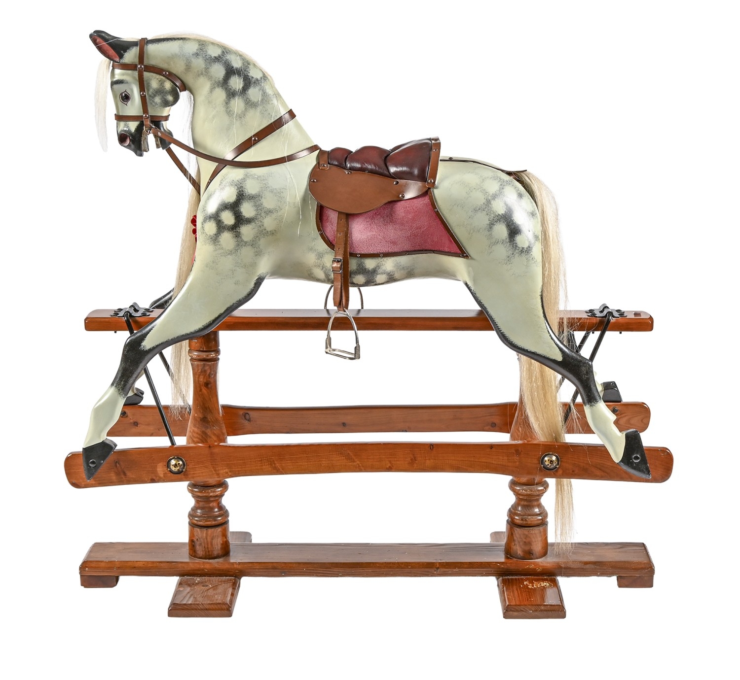 A Lines Brothers painted wood dappled rocking horse, first half 20th c ...