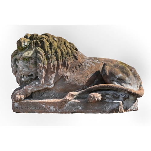 873 - A Victorian over life-sized sandstone sculpture of a lion, on rectangular base, 83cm h, 141cm l, sig... 