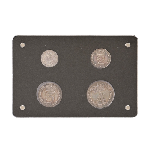 54 - Silver coins. George III Maundy set 1820, toned, cased