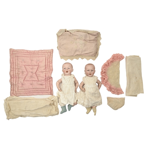 591 - Two Eisenmann & Co bisque headed character dolls, c1910, with intaglio eyes and painted hair, on... 