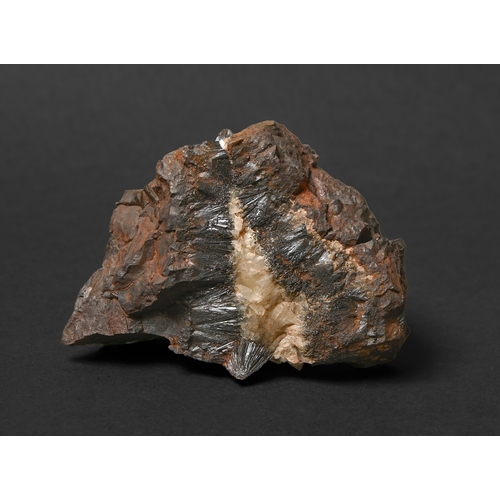 589 - Somerset minerals. Limonite and Goethite, Sanford Hill, 80mm,&nbsp;Goethite and Calcite in Hematite,... 