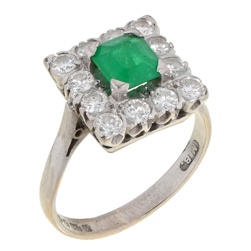 102 - An emerald and diamond ring, in 18ct white gold, London 1975, emerald 5 x 6mm, head 12 x 12mm, 4.8g,... 