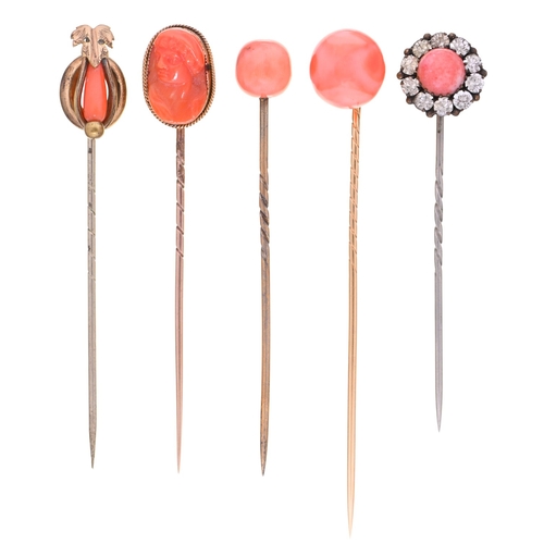 15 - Five Victorian stickpins, with coral cameo or bead terminal, in gold or base metal, cameo head 17mm,... 