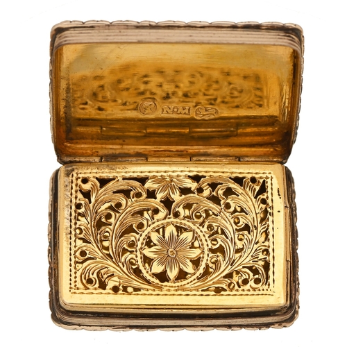 153 - A Victorian silver 'castle top' vinaigrette, the lid die stamped with Kenilworth Castle, foliate eng... 