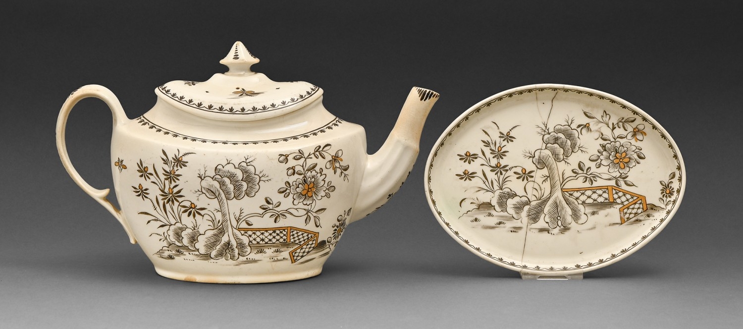 A Pinxton teapot, cover and stand, c1800, painted in black and gilt ...
