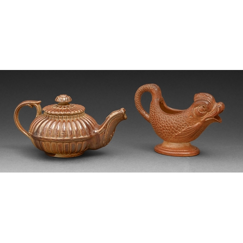 283 - A Brampton brown saltglazed stoneware dolphin sauceboat, Derbyshire, c1840,&nbsp;naturalistically mo... 