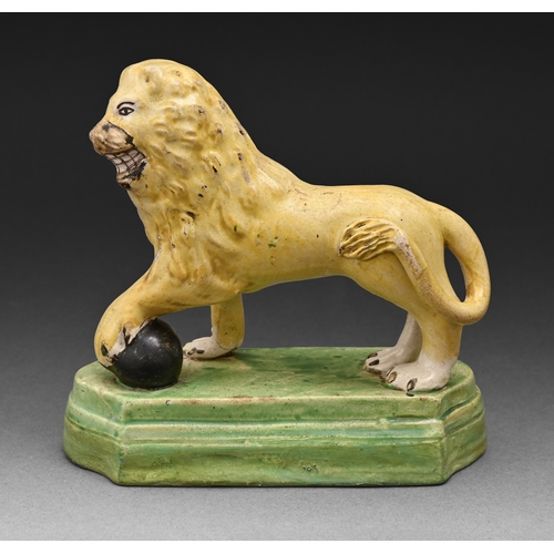 288 - A Staffordshire pearlware model of a lion, c1810, painted in overglaze enamels, 14.5cm h... 
