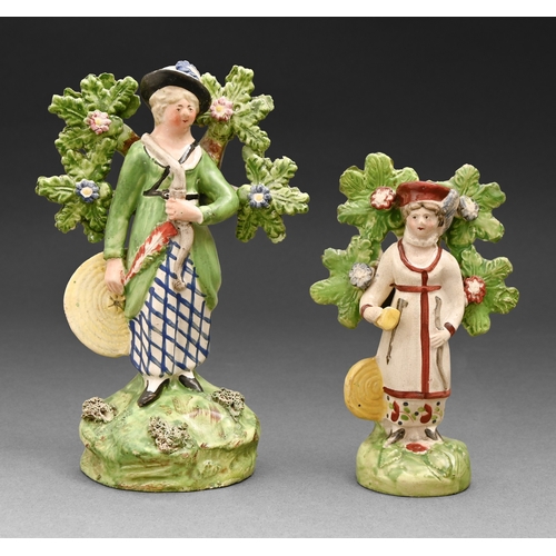 293 - A John Walton pearlware figure of a female archer, c1820, before bocage, painted in overglaze enamel... 