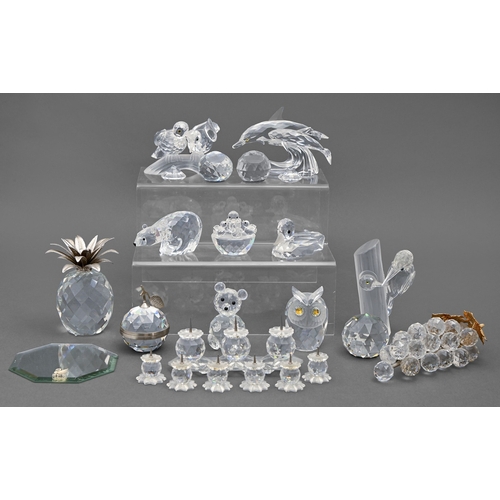 307 - Swarovski. A collection of glass ornaments and candleholders, to include woodpeckers, grapes, polar ... 