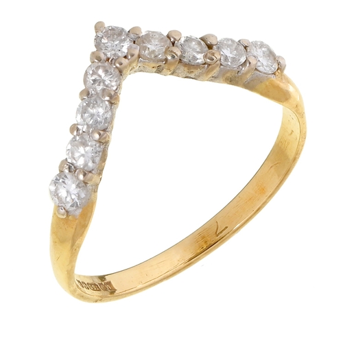 46 - A diamond dart ring, in 18ct gold, import marked London 1989, 2.6g, size P