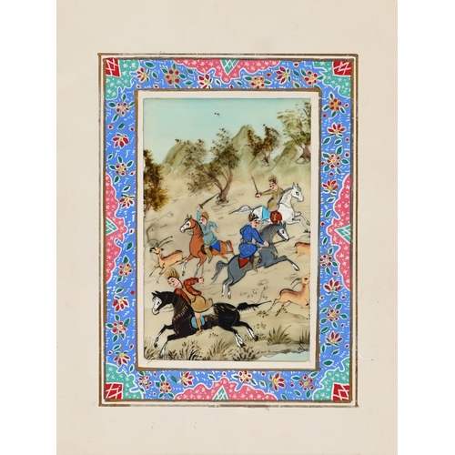 667 - An Indian illuminated leaf, 19th c, in the Mughal manner, centred by a dignitary on horseback, with ... 