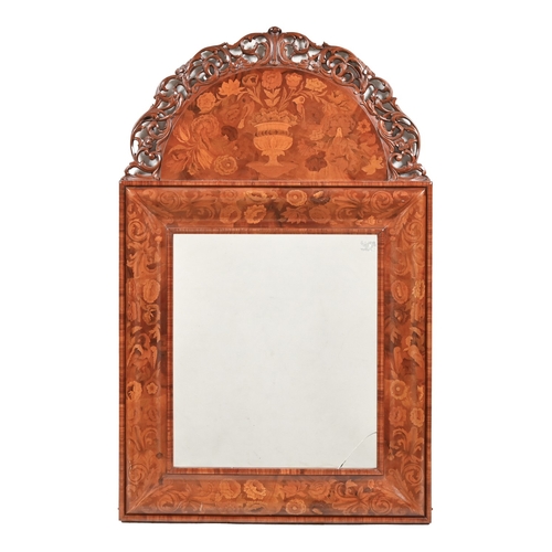 696 - A walnut and floral marquetry mirror in William & Mary style, with carved and pierced cresting, ... 