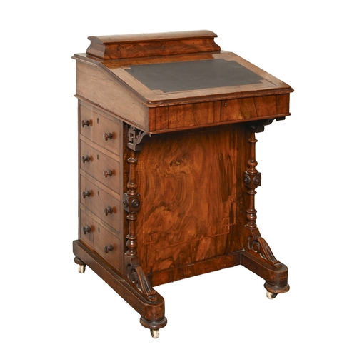 703 - A Victorian inlaid walnut davenport, on pottery castors, 83cm h; 54 x 52cm