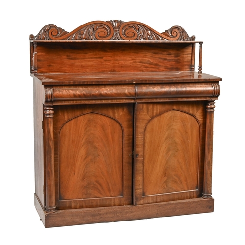 773 - A Victorian carved mahogany chiffonier, the lower part enclosed by panelled doors flanked by pillars... 