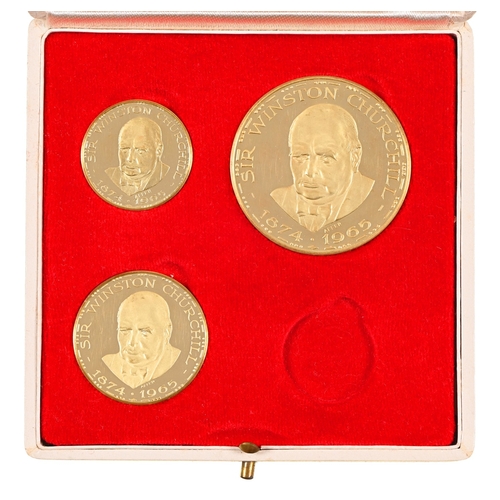 83 - Sir Winston Churchill. A set of three 18ct gold commemorative medals, 40mm diam and smaller, by Meta... 