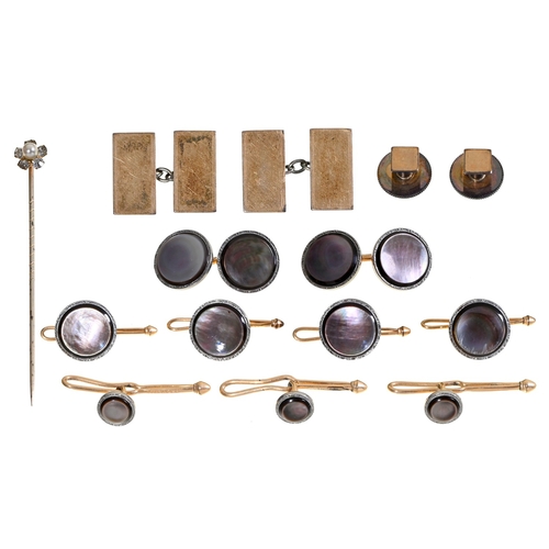 87 - Krementz & Co. An American black mother-of-pearl and gold-overlaid dress set, c1930, cufflinks 1... 