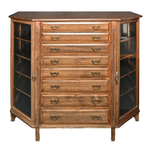 750 - A Victorian walnut collector's cabinet, c1900, splay-fronted and fitted with eight graduated moulded... 