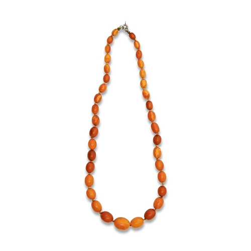 126 - A necklace of amber beads,&nbsp; 23.3g