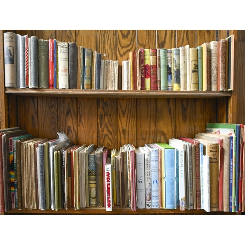 579 - Children's Books. Two shelves, late 19th c and later, including first and other English editions of ... 