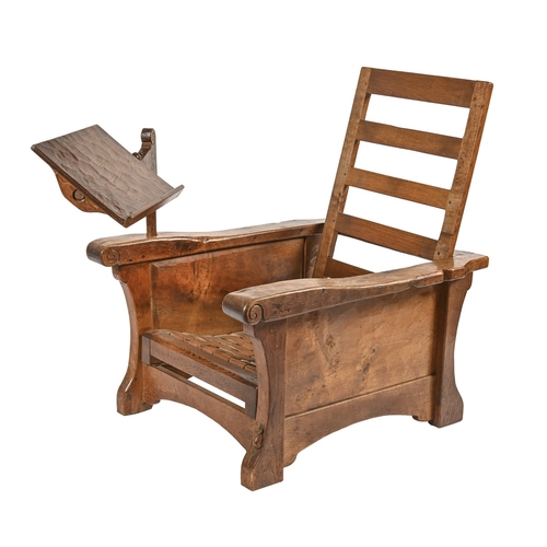 751 - Robert 'Mouseman' Thompson. An oak adjustable armchair, c1930s, with leather webbed seat, over-scrol... 