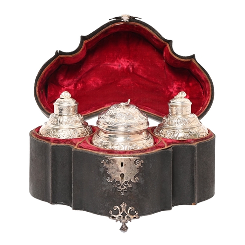 185 - A pair of George II Rococo silver tea caddies and sugar box,&nbsp;the ogee caddies and oval ogee box... 