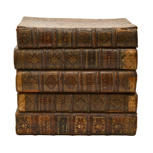 541 - A French liqueur set, the case formed from antique French gilt tooled leather bound books, with a pa... 